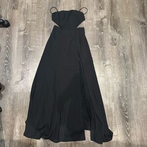 Long black dress with a high slit